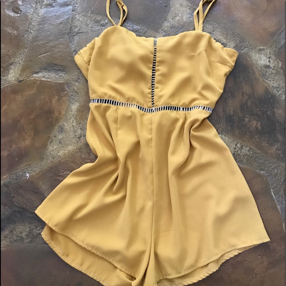 Shareen Collections Golden Open Back Romper